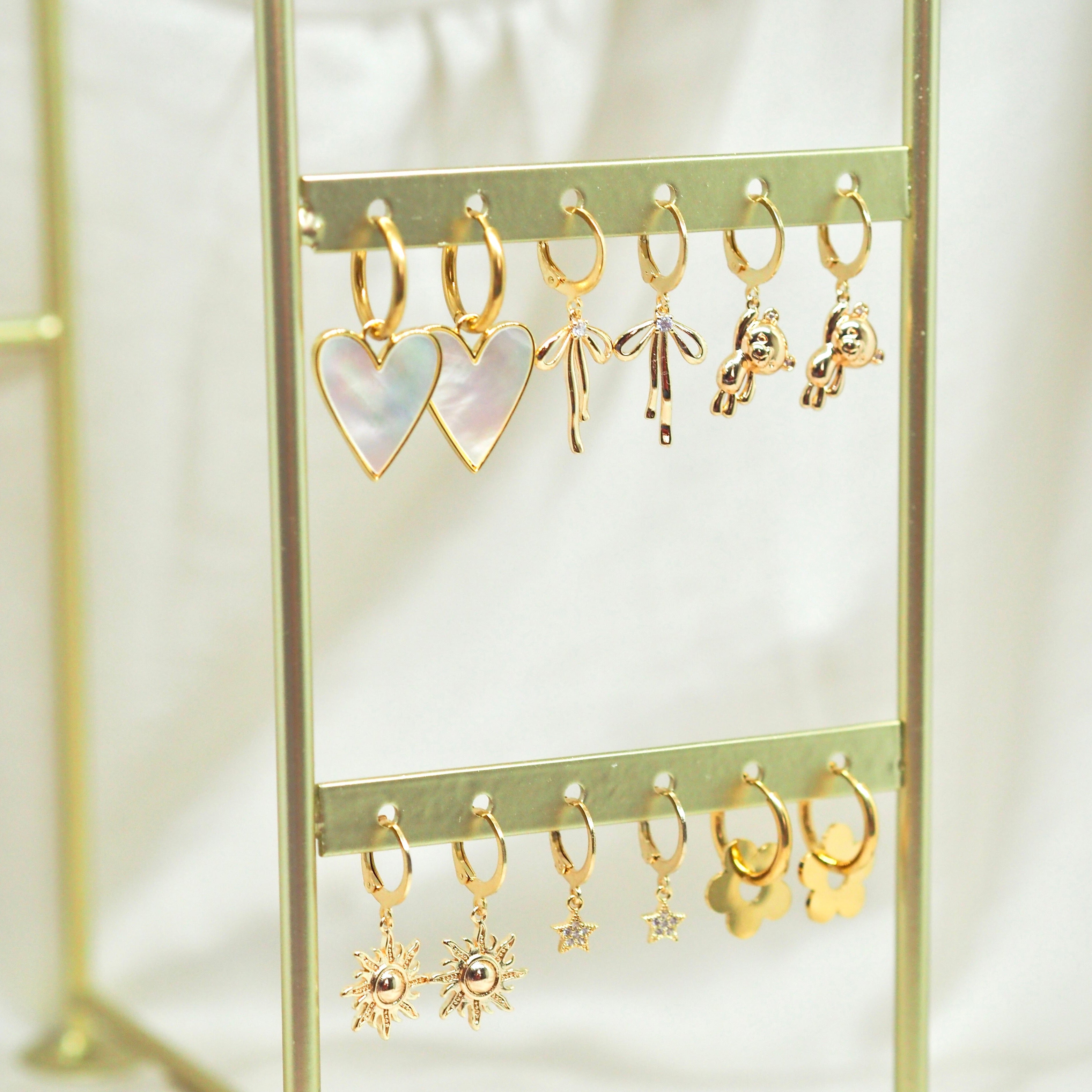 Edelstahlcreolen mit Perlmuttherz