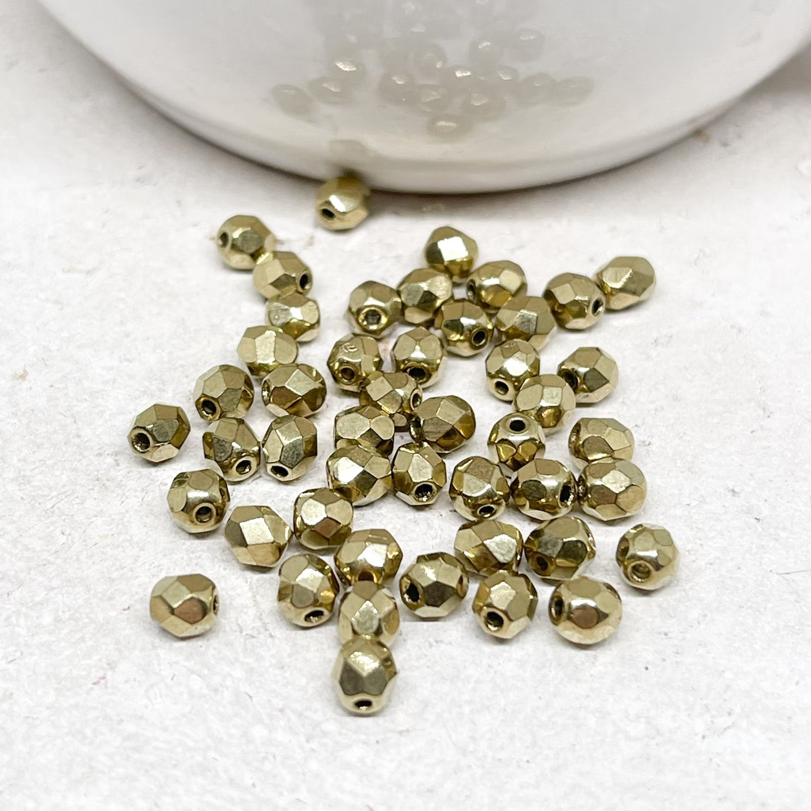 Böhmische Glasschliffperlen 4mm Bronze 100 St.