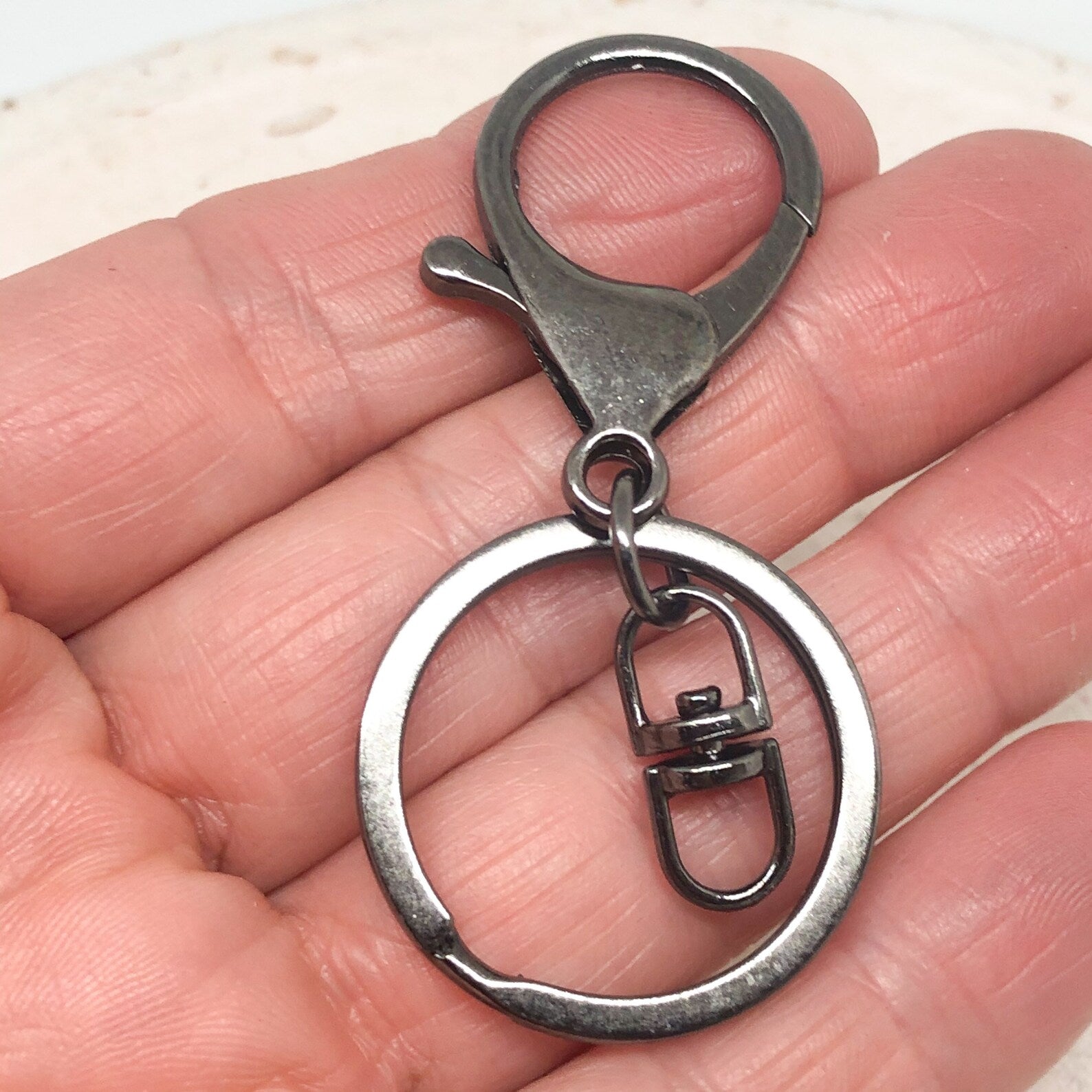 Schlüsselanhänger mit Karabinerverschluss Eisen Farbe