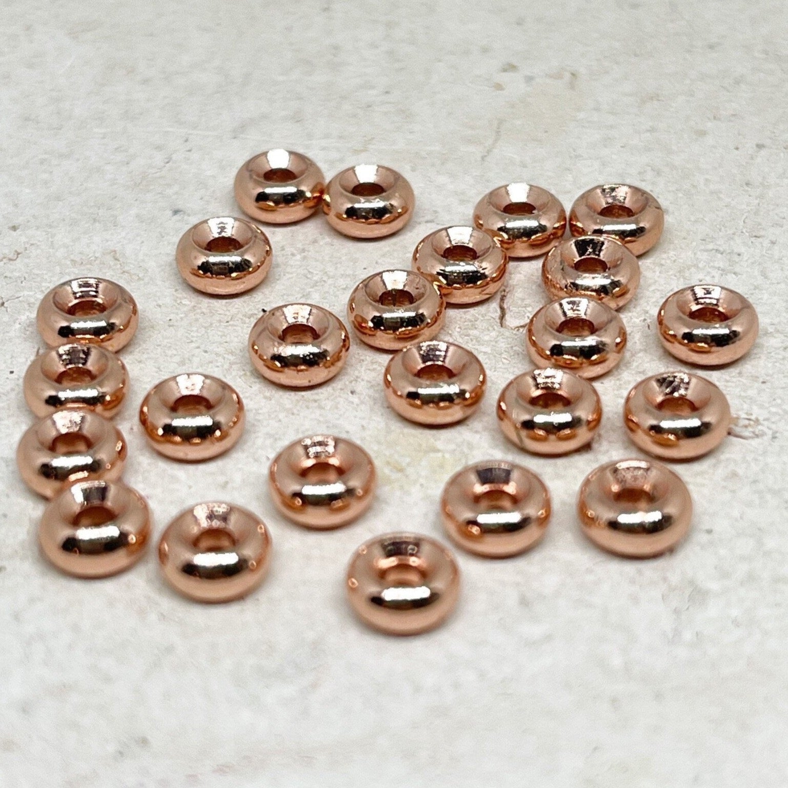 Spacer Messingperlen 6mm 10 St. rosévergoldet