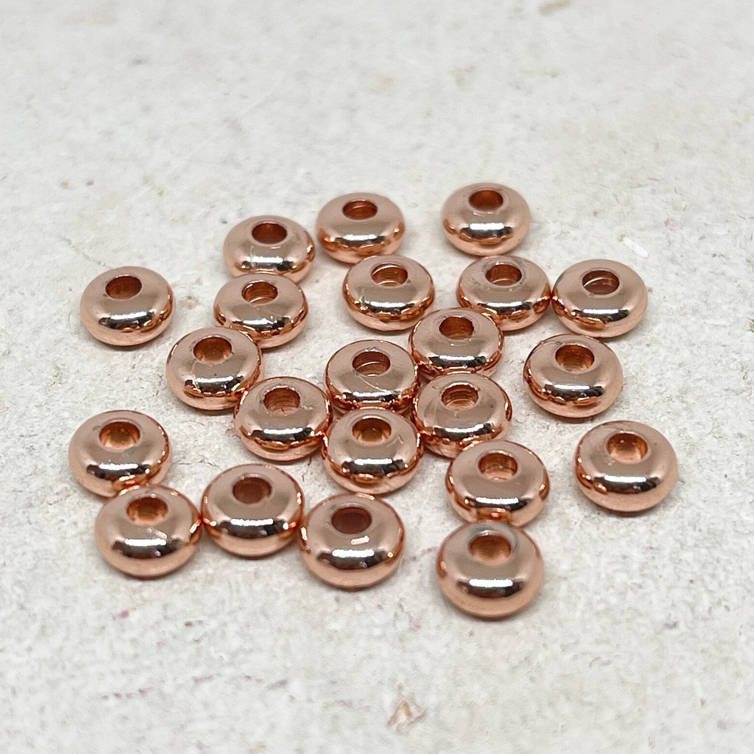 Spacer Messingperlen 25 St. 6mm - Rosegoldfarben
