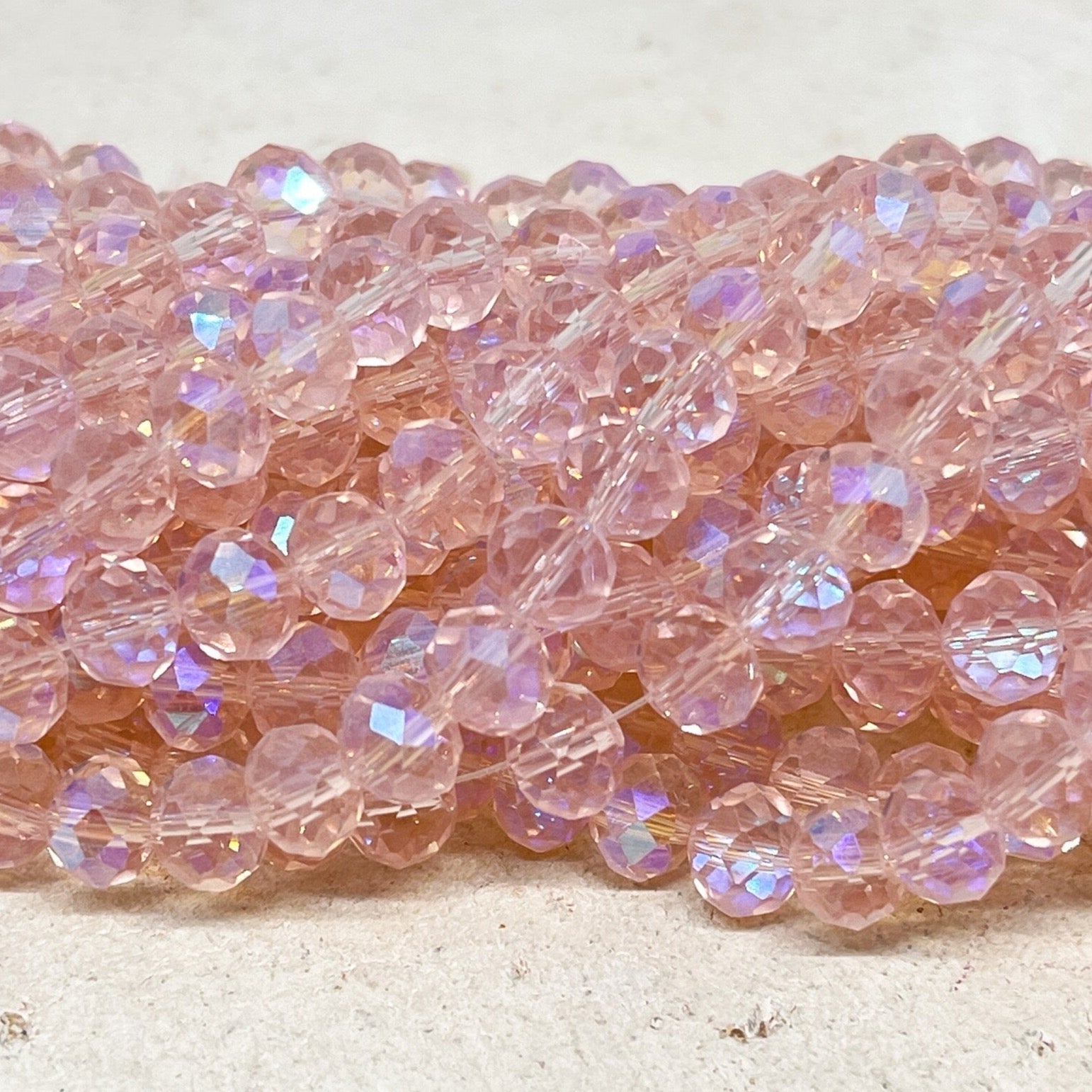 Kristallperlen 8mm Glasschliffperlen 66 St. - Rosa mit Violettschimmer