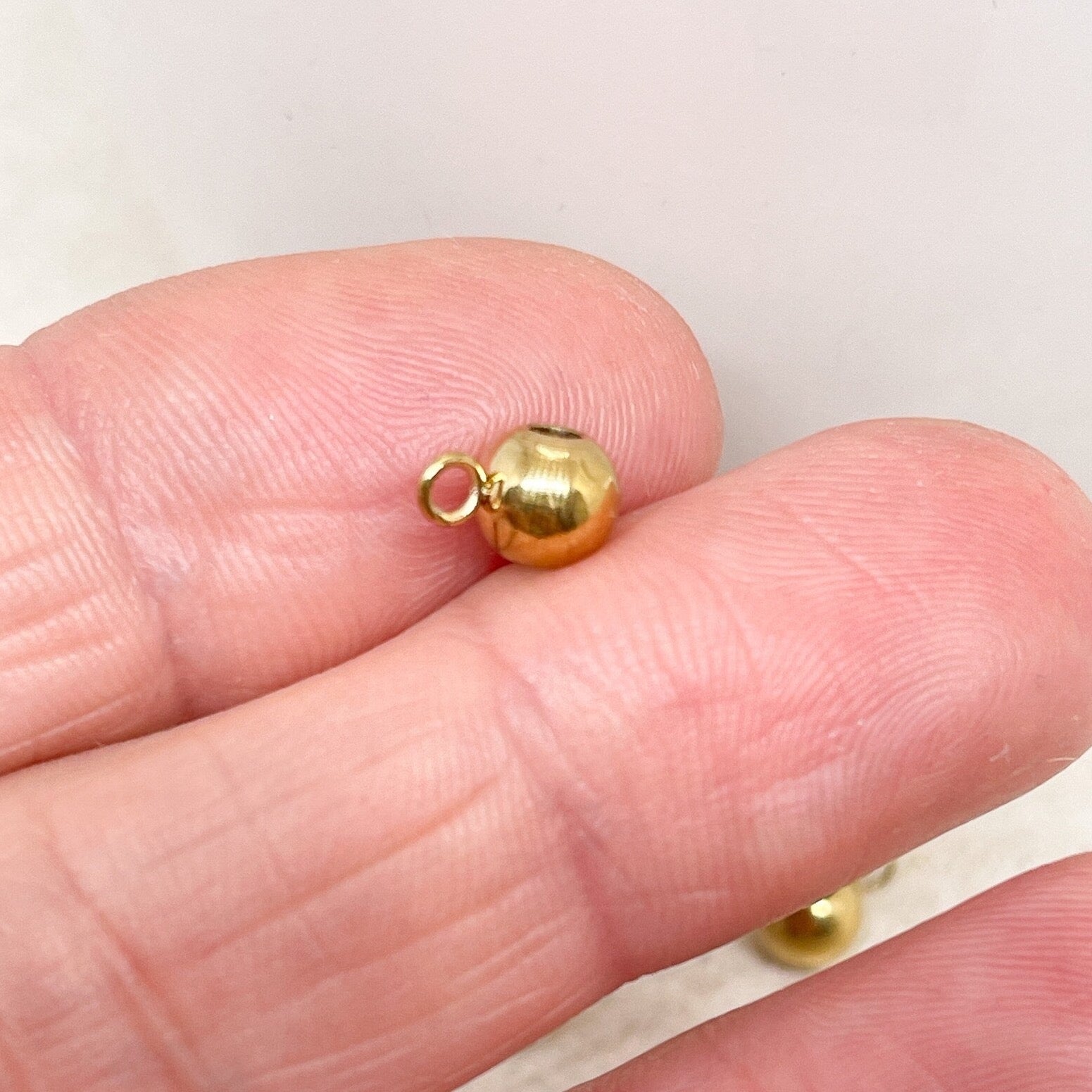 Anhängerschlaufe aus Edelstahl 4St. IP Ionenbeschichtung - goldfarben