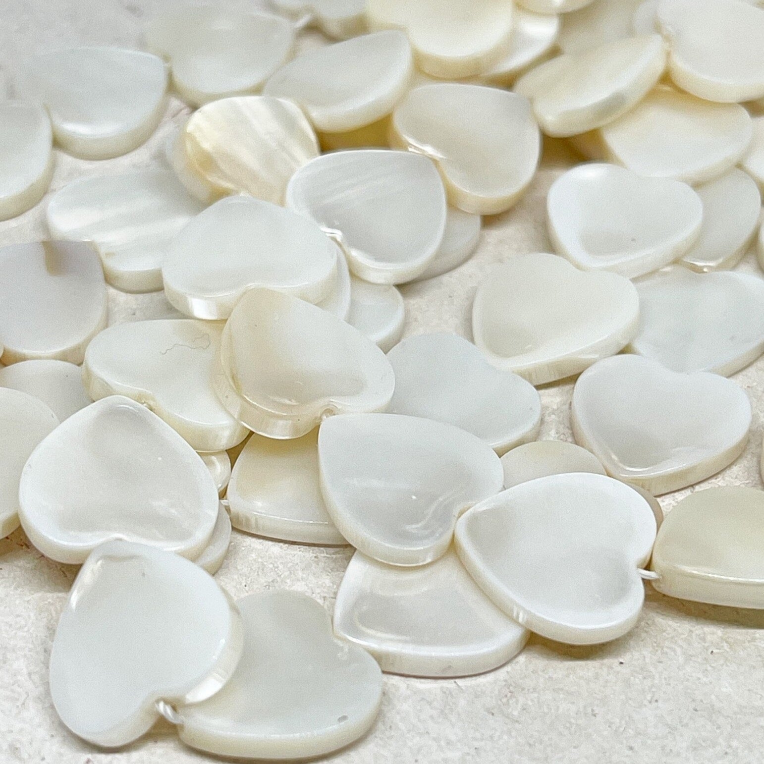 Perlmutt Herzen 14mm