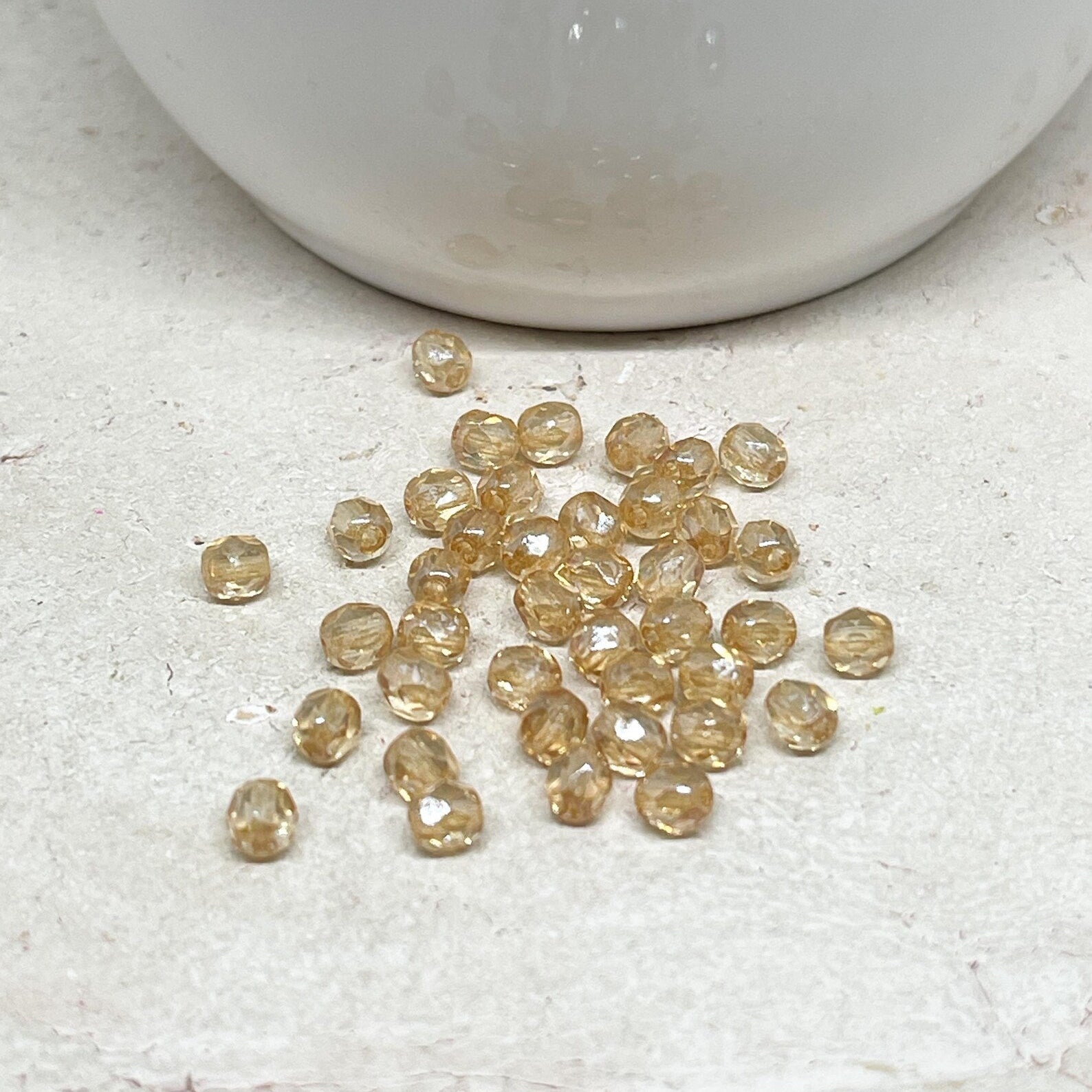 Böhmische Glasschliffperlen 4mm 100 St. Champagne Beige