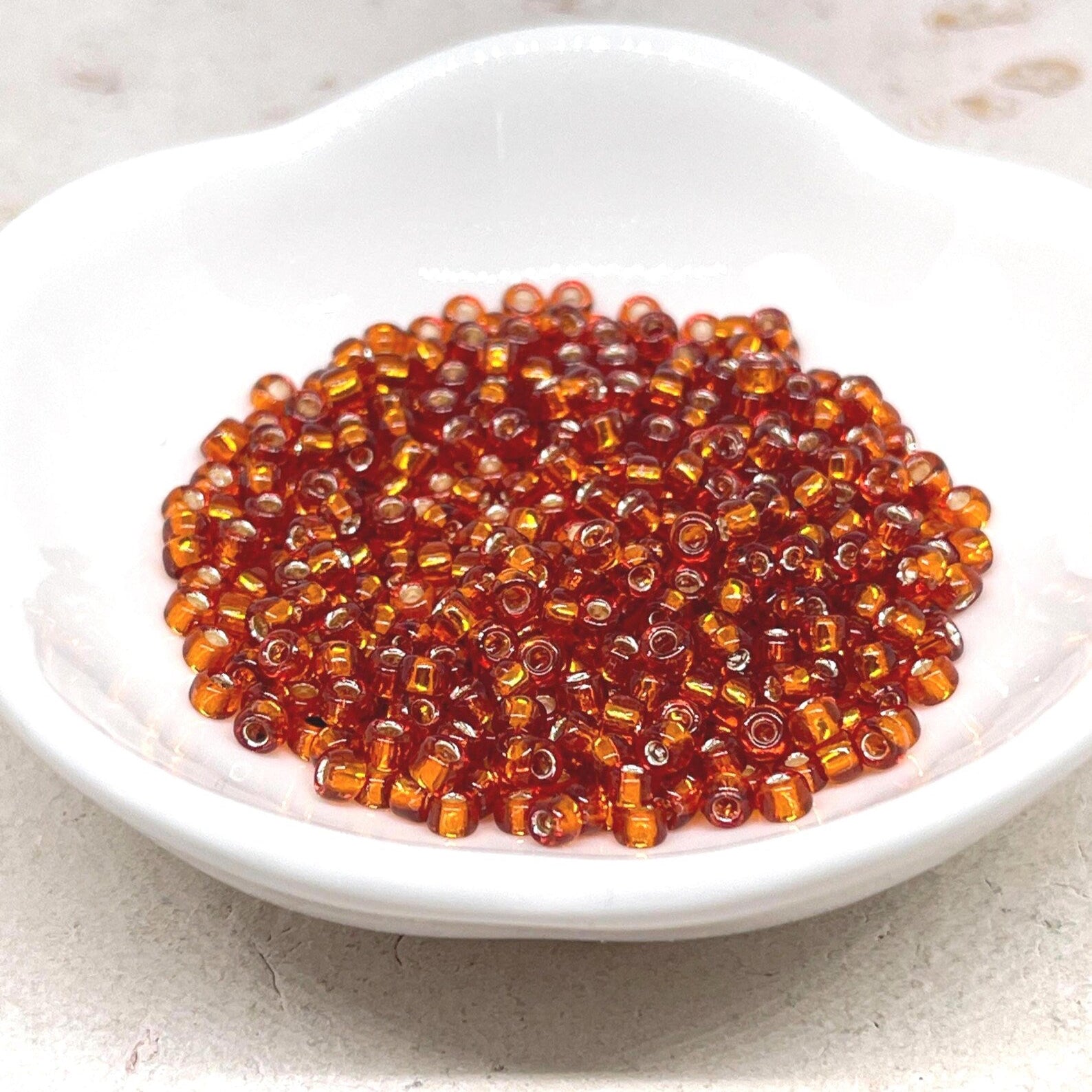 TOHO Beads Perlen Rocaille 10g Nr. 2208 Silver Lined Burnt Orange