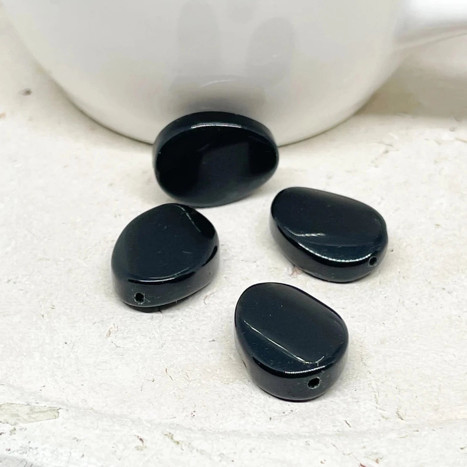 Onyx Ovale Perle 4 St. Schwarz 20mm