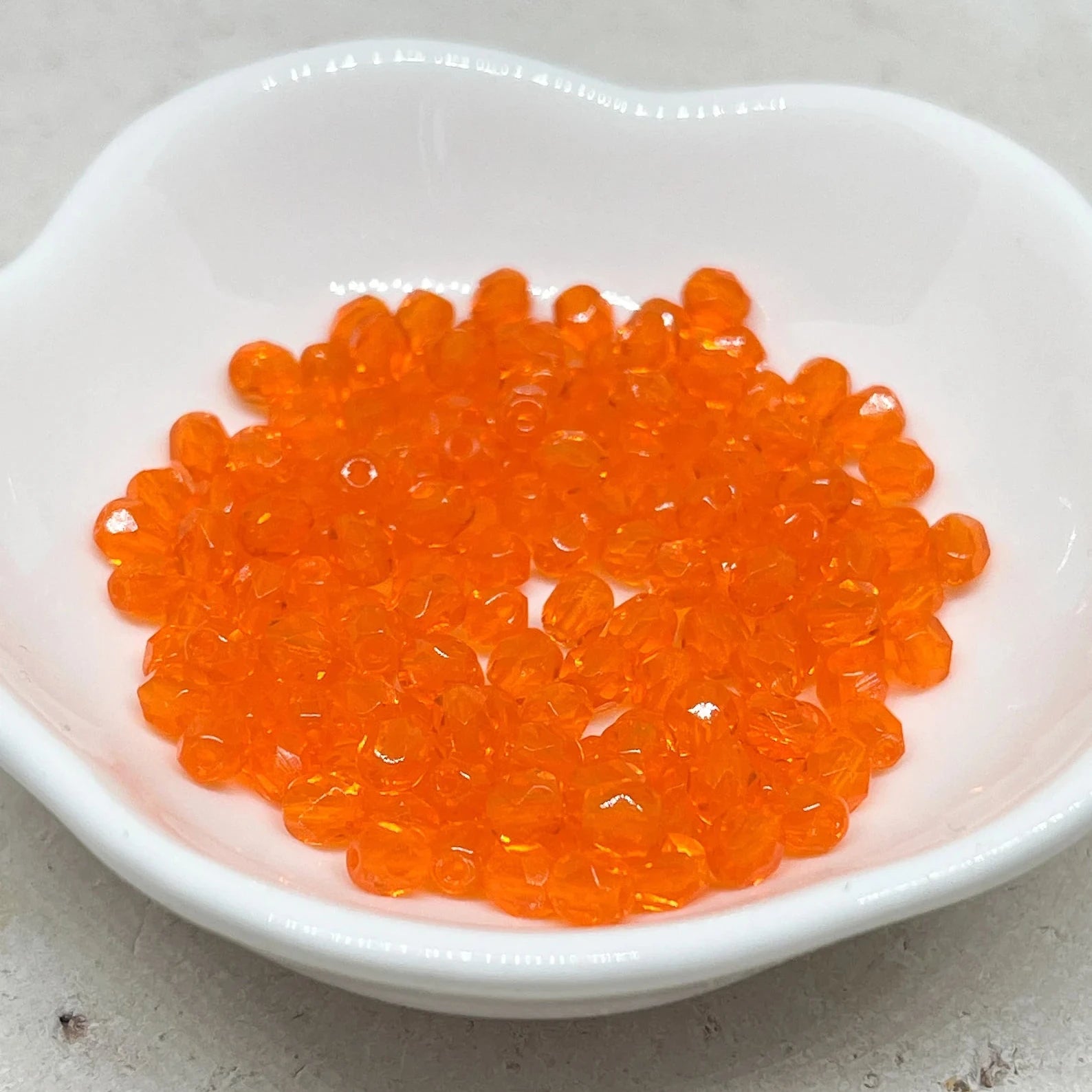 Böhmische Glasschliffperlen 4mm 100 St. Hyacinth Orange transparent