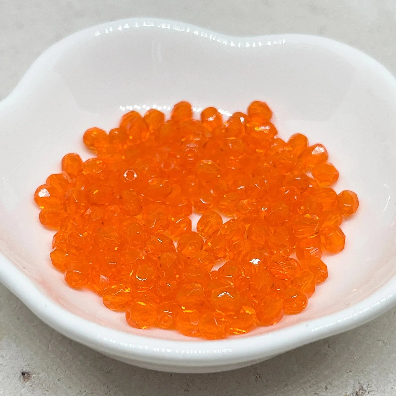 Böhmische Glasschliffperlen 4mm 100 St. Hell Orange