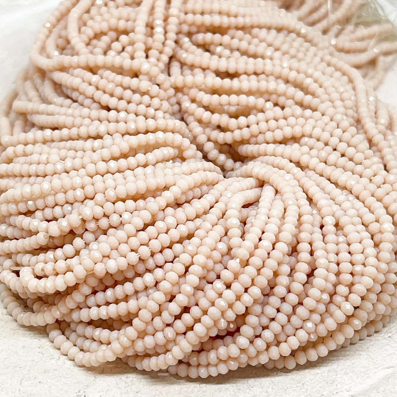 Glasschliffperlen 2mm Beige