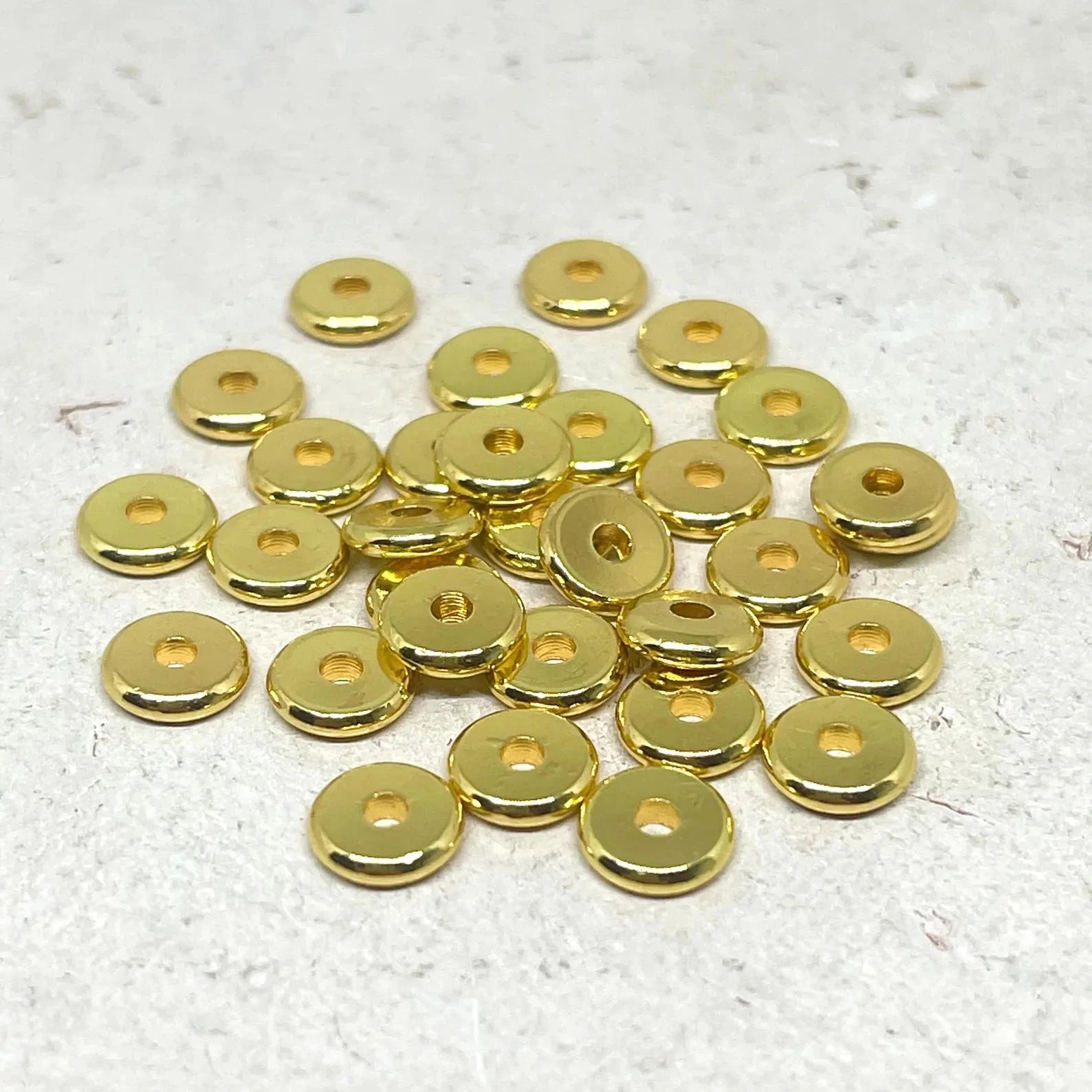 Zwischenperle / Spacer Perle aus Messing Donut 8mm 24K, vergoldet. 