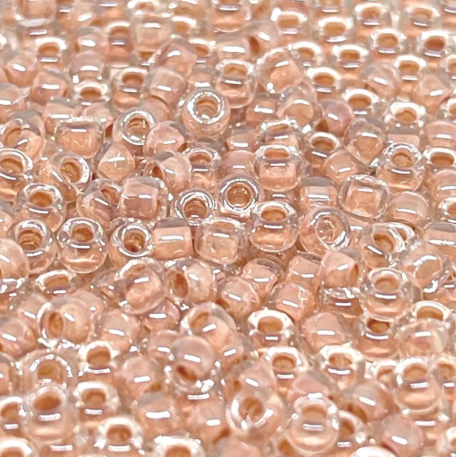 TOHO Beads Perlen Rocaille 10g Nr. 1067 Inside Color Gray/Magenta Lined