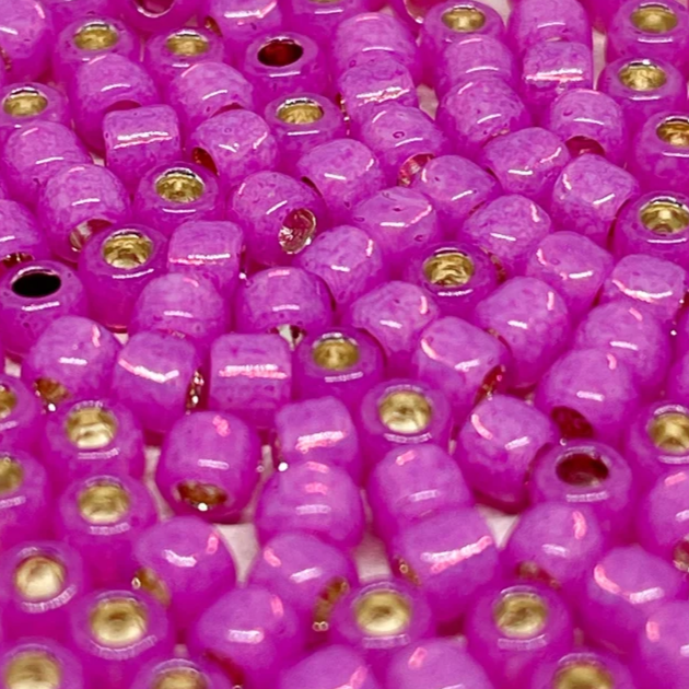 TOHO Perlen Rocaille 6/0 4mm 10g Milky Hot Pink