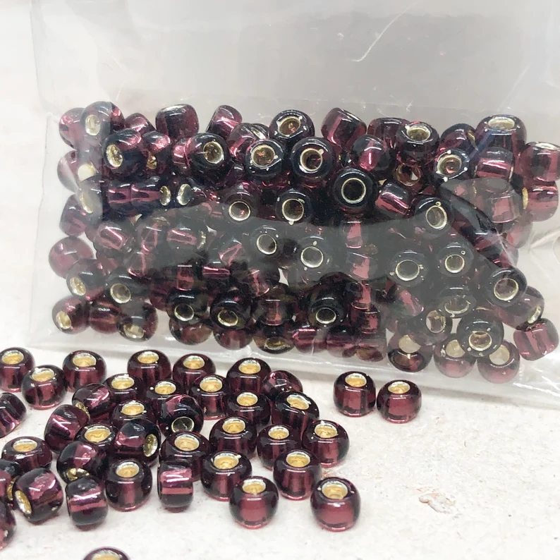 TOHO Perlen Rocaille 6/0 4mm 10 Gramm Lila Nr. 26C