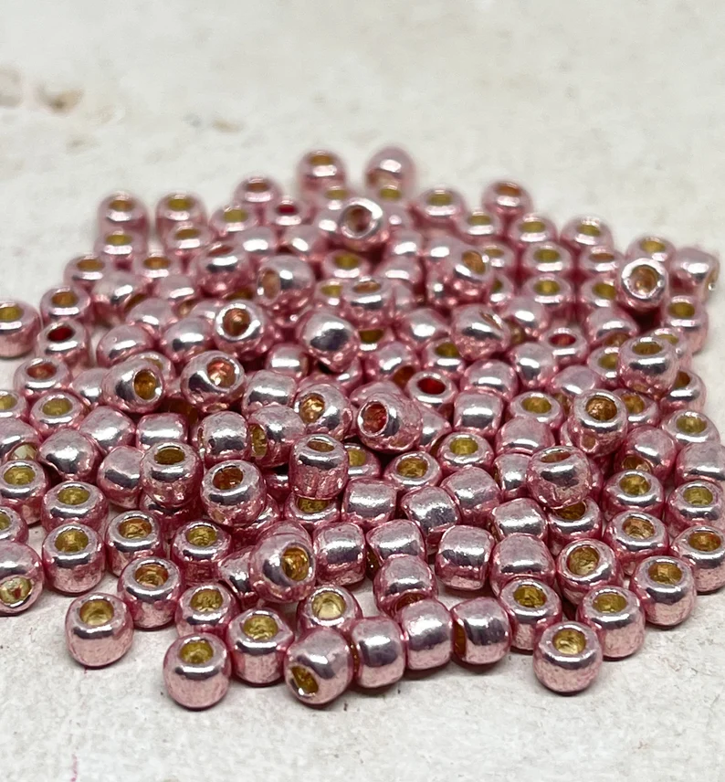 TOHO Perlen Rocaille 6/0 4mm 10 Gramm Rosa