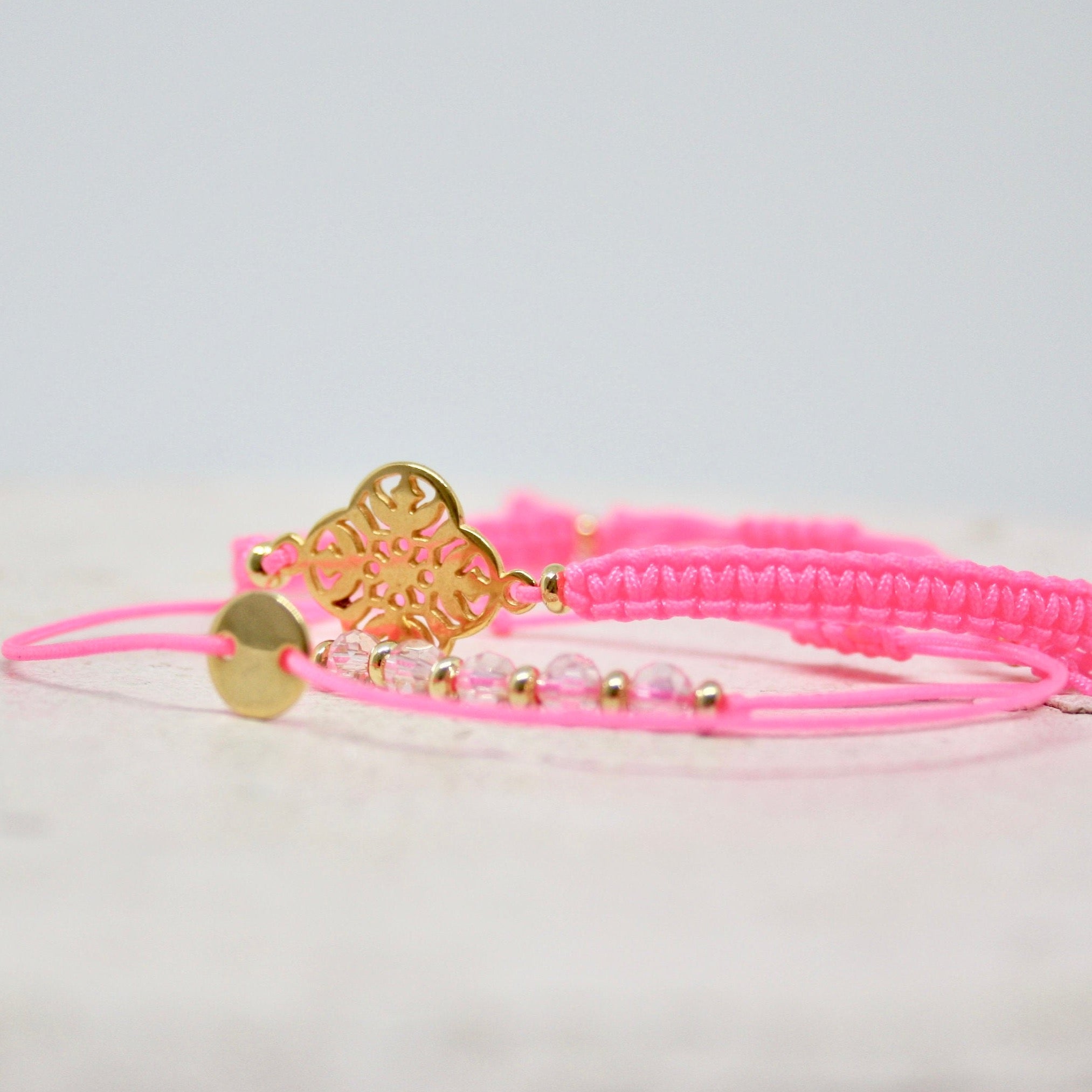 Drei Armbänder Neon Rosa-Gold