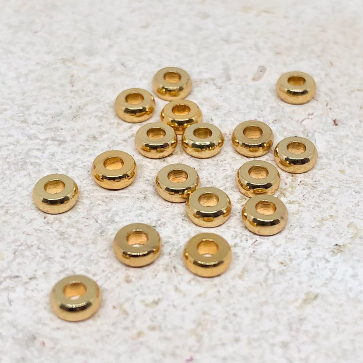 Spacer Messing Perlen 30 St. 5mm x 2mm - Goldfarben