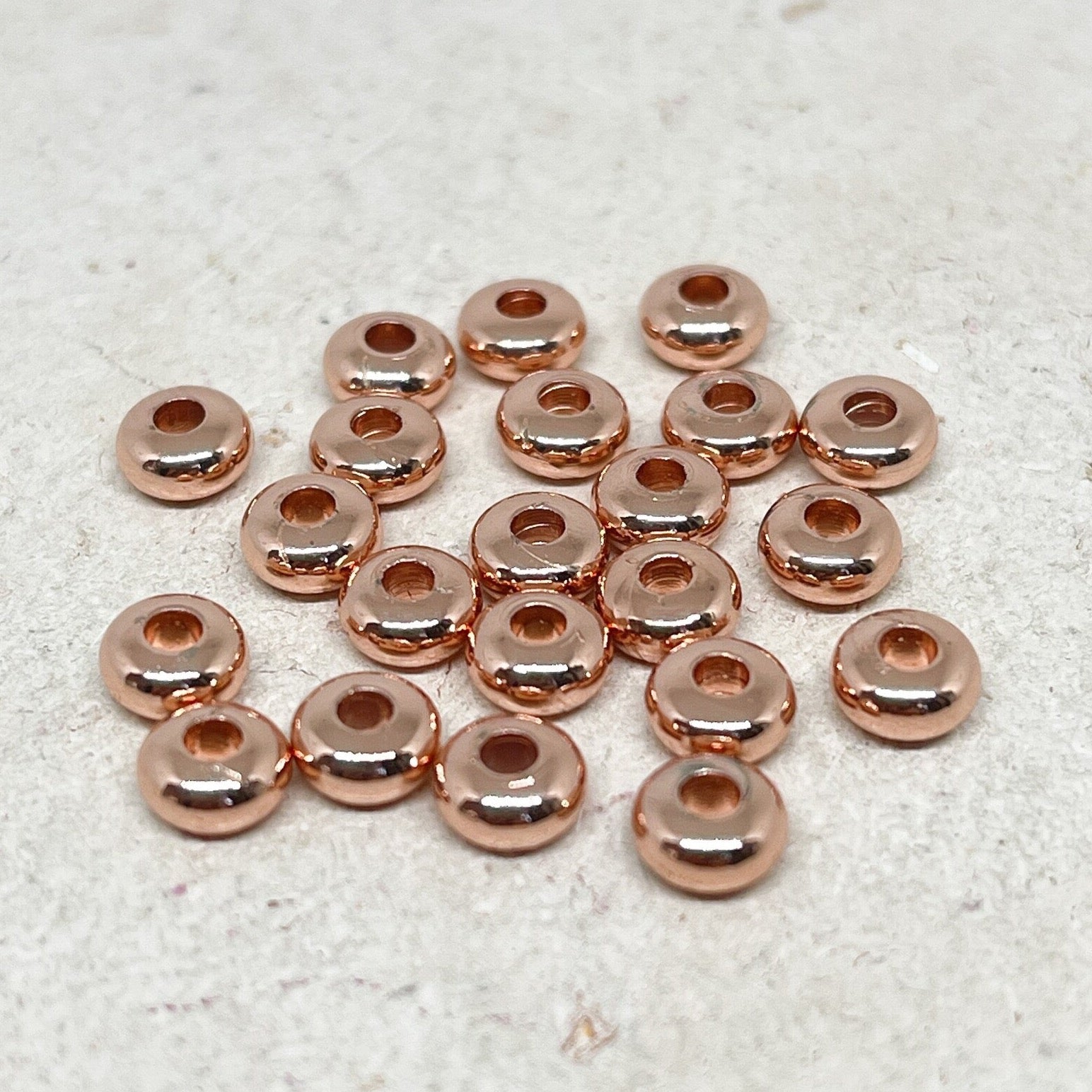 Spacer Messingperlen 25 St. 6mm - Rosegoldfarben