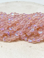 86 St. Kristallperlen 6mm Glasschliffperlen - Hellrosa mit Violettschimmer