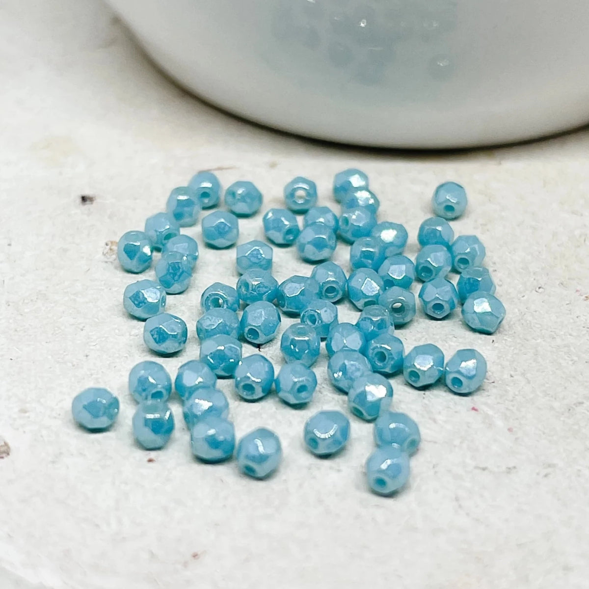 100 St. Böhmische Glasschliffperlen 3mm - Luster Sky Blue Coral