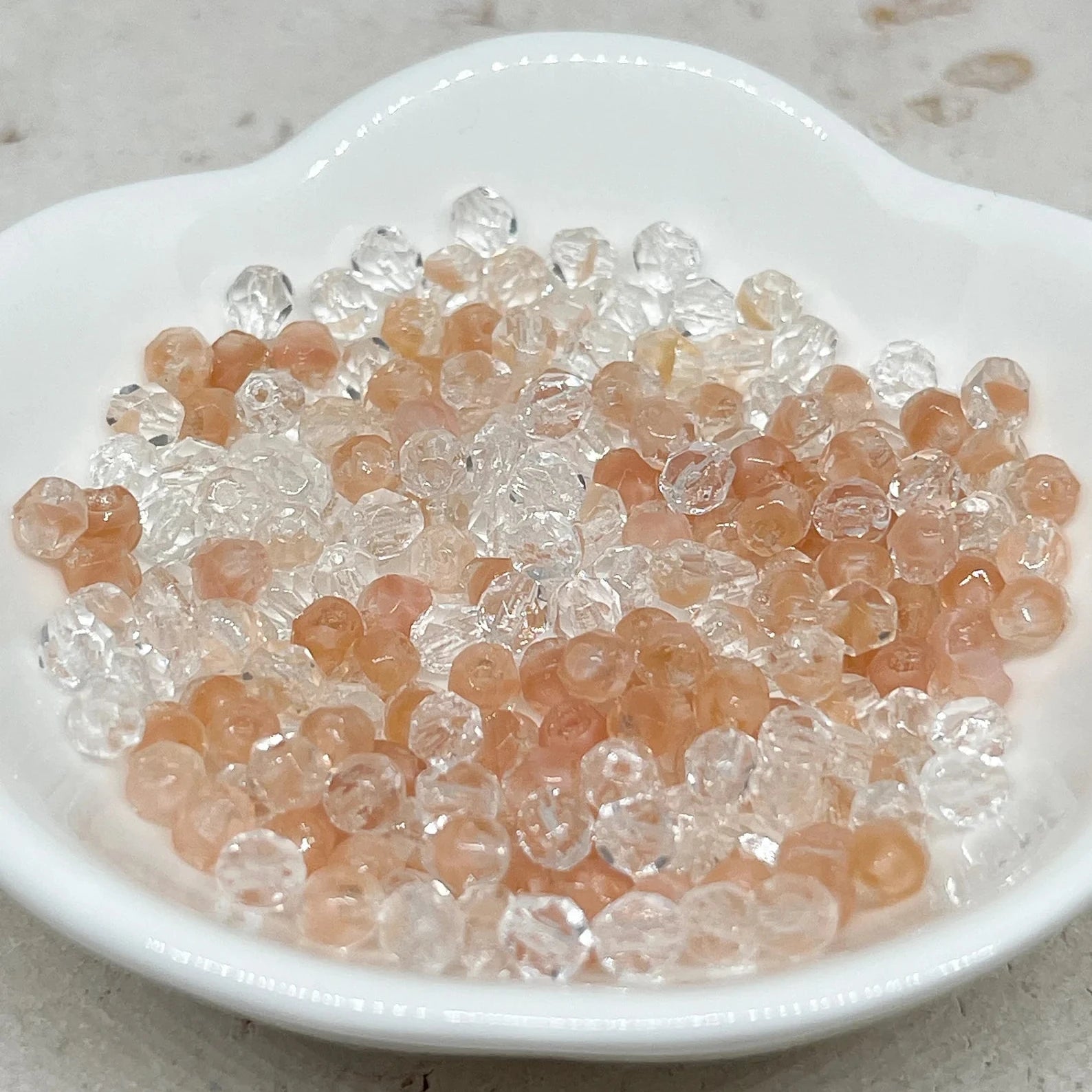 Böhmische Glasschliffperlen 4mm 100 St. Hellrosa/Crystal