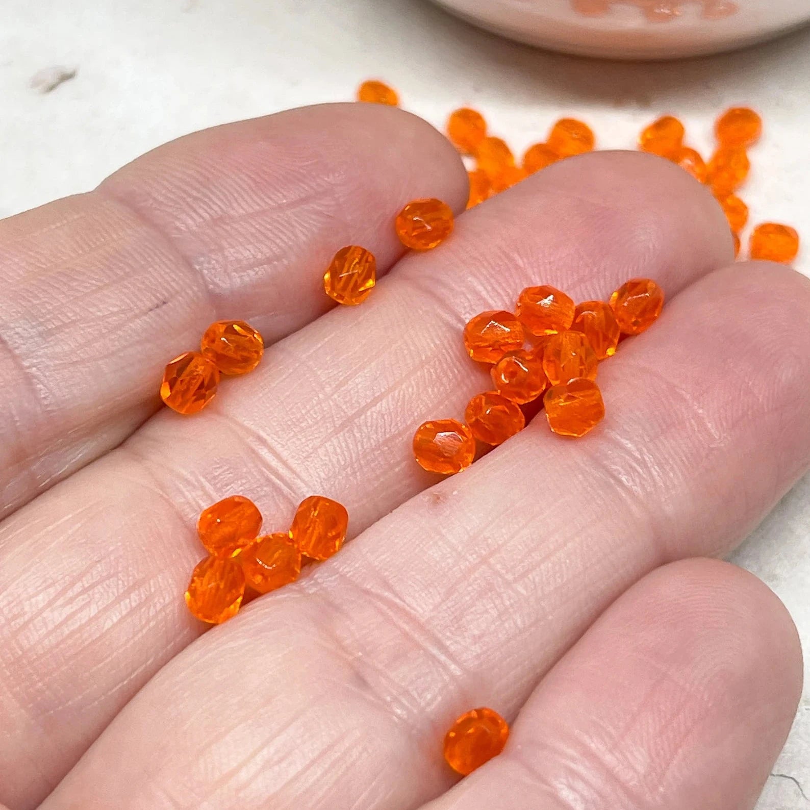 Böhmische Glasschliffperlen 4mm 100 St. Hell Orange