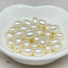 Acryl Perlen Oval Creme Weiß 25 St.