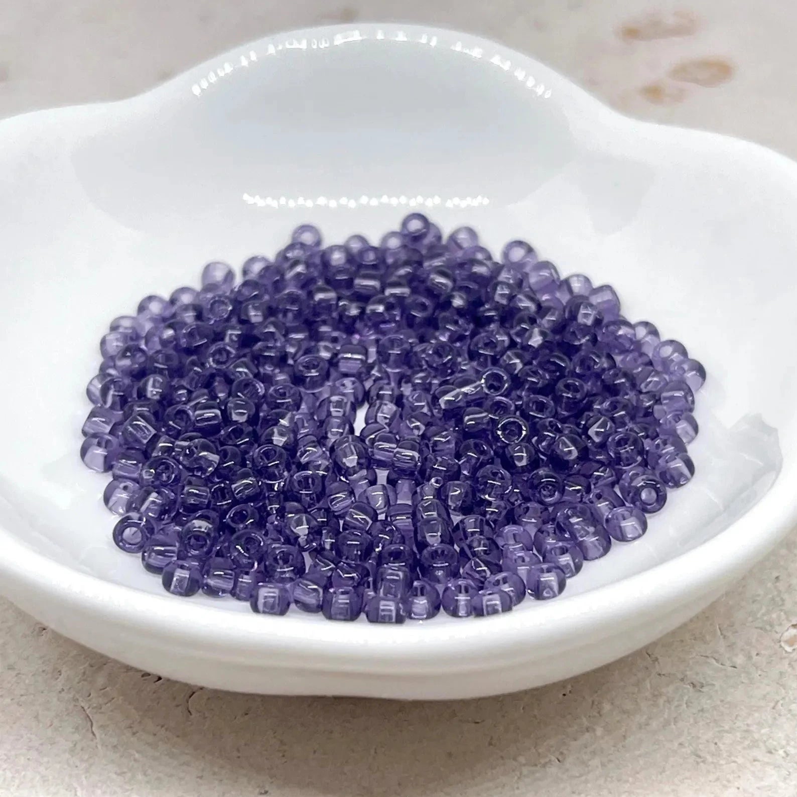 TOHO Beads Perlen Rocaille 10g Nr. 19 Transparent Suger Plum