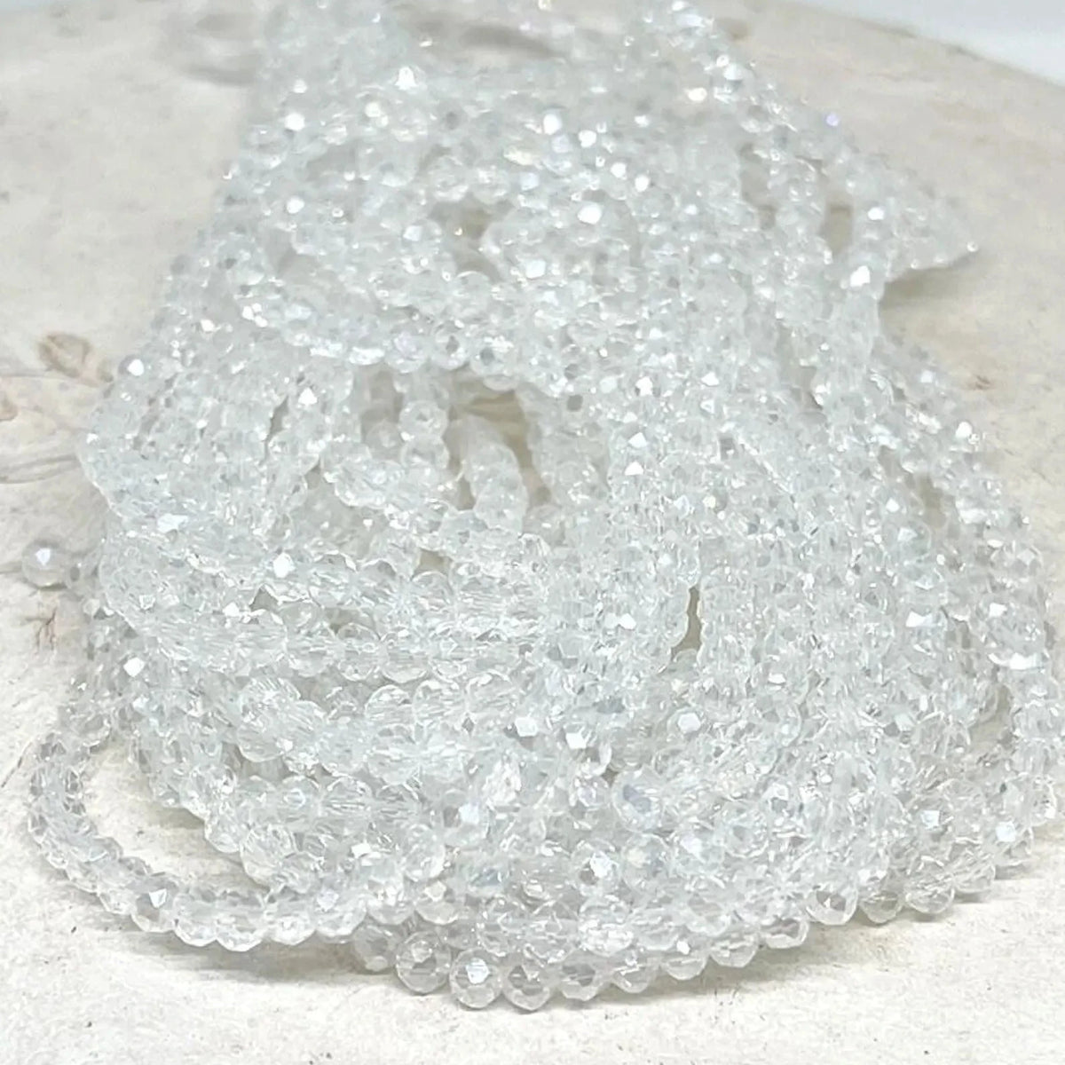 Glasschliffperlen 4mm - Kristall ab