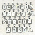 Buchstaben Anhänger aus 304 Edelstahl und Perlmutt.