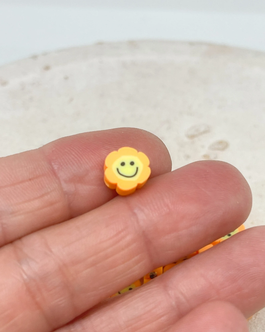 25 St. / 50 St. Polymer Clay Perlen kleine Sonnenblume Gesicht Orange