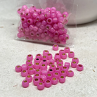 TOHO Perlen Rocaille 6/0 4mm 10g Milky Hot Pink