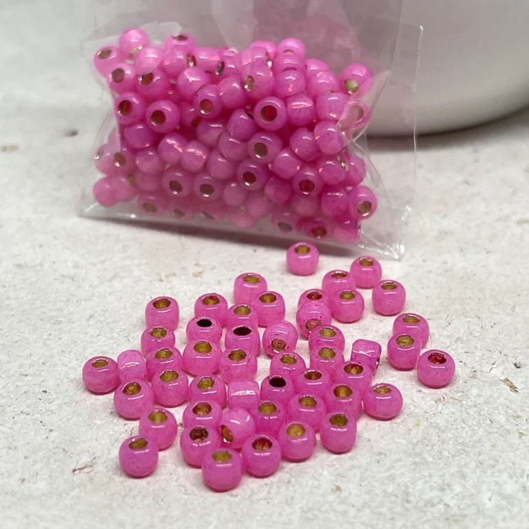 TOHO Perlen Rocaille 6/0 4mm 10g Milky Hot Pink