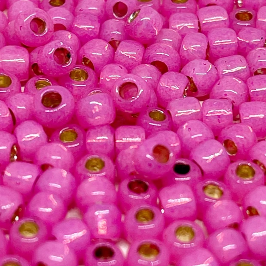 TOHO Perlen Rocaille 6/0 4mm 10g Milky Hot Pink