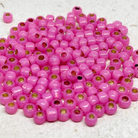 TOHO Perlen Rocaille 6/0 4mm 10g Milky Hot Pink