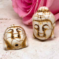 3St. Buddha Kopf Perlen aus syn. Howlith
