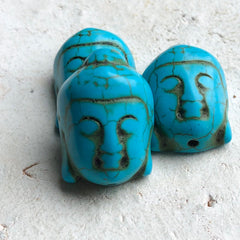 3 St. Buddha Kopf Perlen aus syn. Howlith