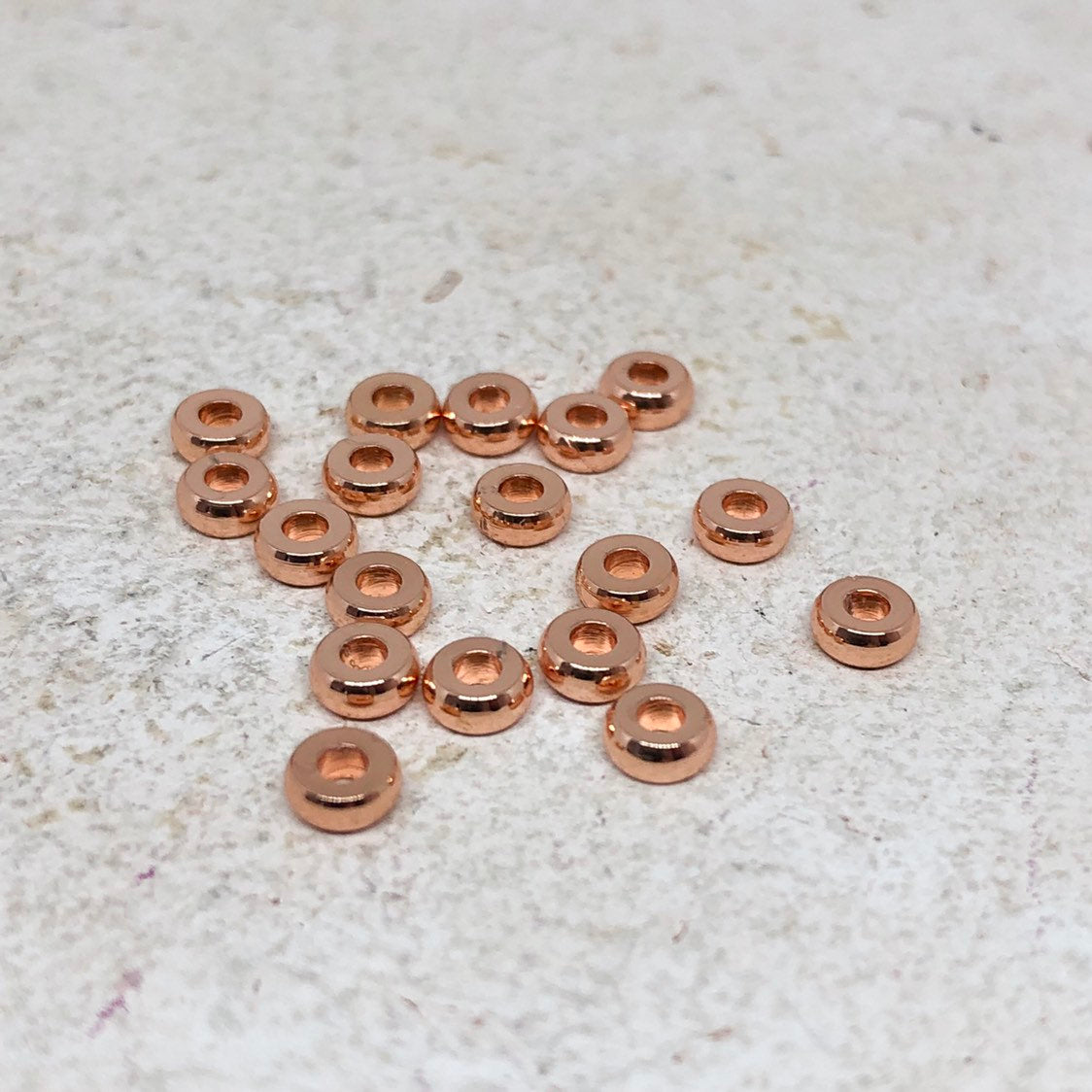 Spacer Messingperle 4mm 30 St. rosévergoldet