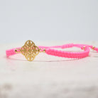 Drei Armbänder Neon Rosa-Gold 