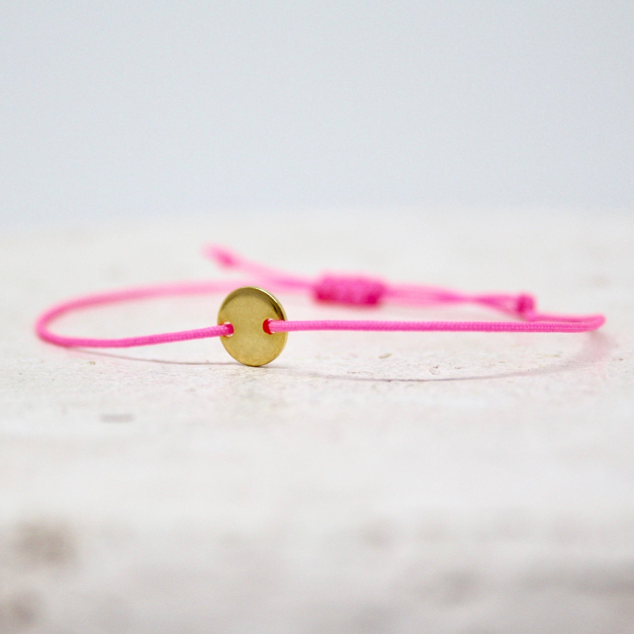 Drei Armbänder Neon Rosa-Gold